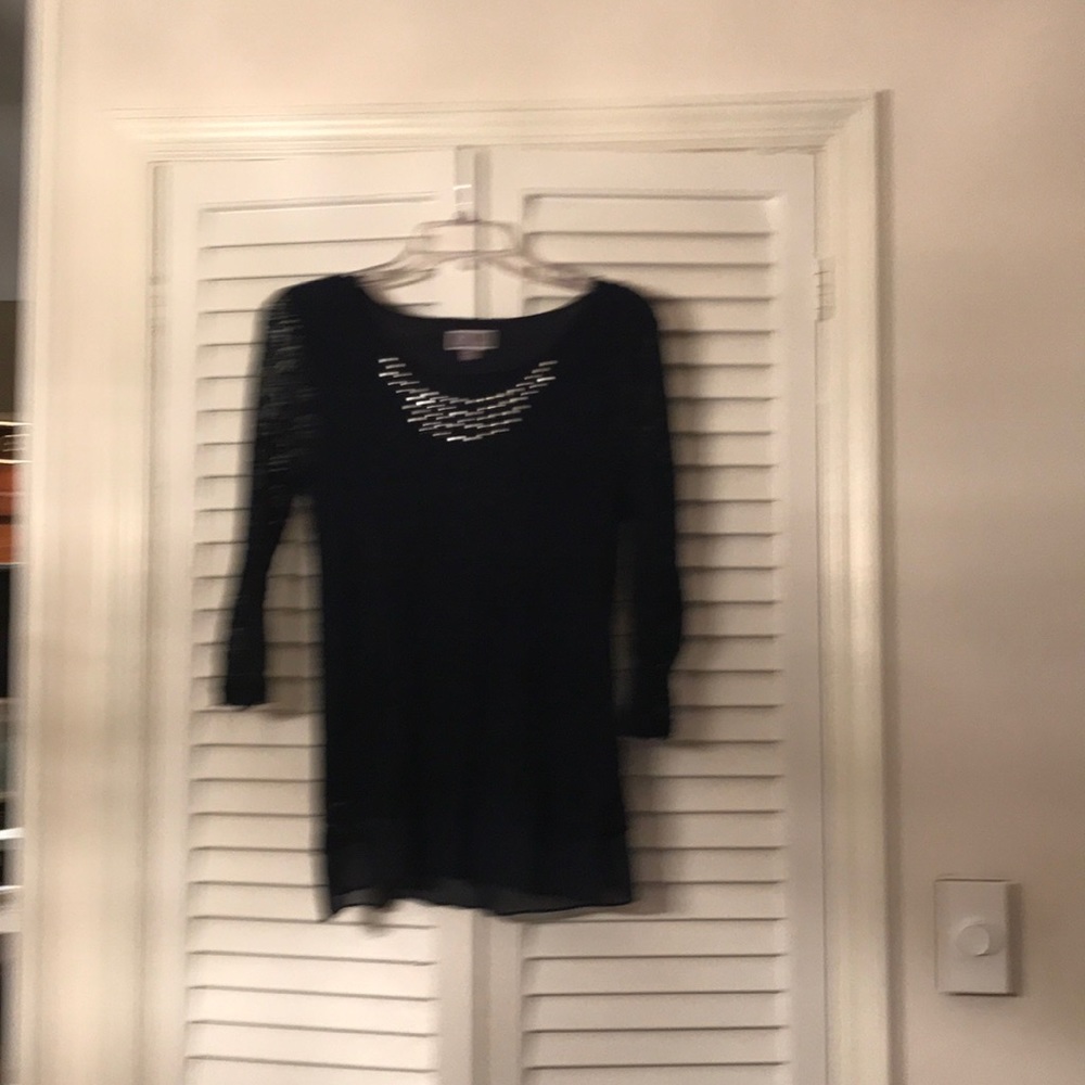 Lace blouse with silver studded neckline